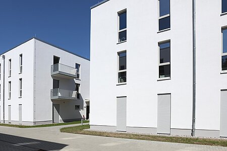 Wohnhäuser für geflüchtete Personen